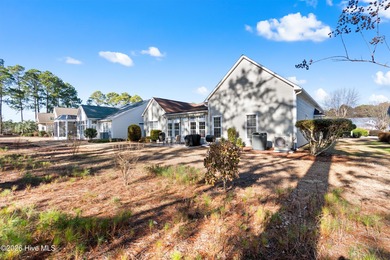 Welcome to 7401 Balmore Drive SW- your next primary residence or on Sandpiper Bay Golf and Country Club in North Carolina - for sale on GolfHomes.com, golf home, golf lot