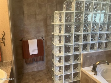 This ground Floor Villa with two master Bedroom Suites is on Desert Forest Golf Club in Arizona - for sale on GolfHomes.com, golf home, golf lot