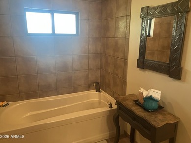 This ground Floor Villa with two master Bedroom Suites is on Desert Forest Golf Club in Arizona - for sale on GolfHomes.com, golf home, golf lot