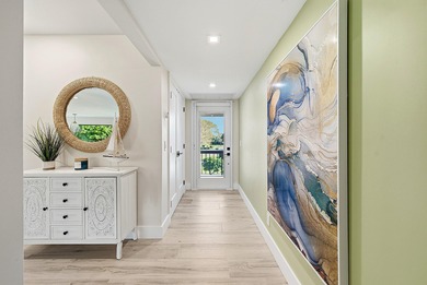 Tranquil golf course views from this 2-bedroom, 2-bath on Quail Ridge Golf Course and Country Club in Florida - for sale on GolfHomes.com, golf home, golf lot