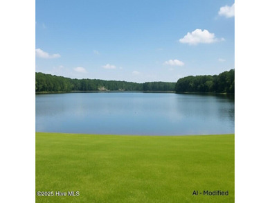 Exceptional .95-acre lakefront lot within the exclusive Pinewild on Pinewild Country Club of Pinehurst in North Carolina - for sale on GolfHomes.com, golf home, golf lot