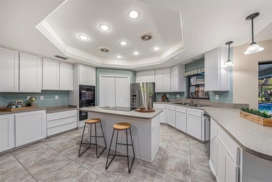 Welcome to spacious Florida living in the desirable Lake on The Links of Lake Bernadette in Florida - for sale on GolfHomes.com, golf home, golf lot