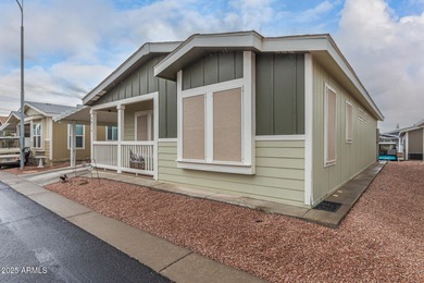 Enjoy easy living in this charming 3-bedroom mobile home with on Viewpoint Golf Resort in Arizona - for sale on GolfHomes.com, golf home, golf lot