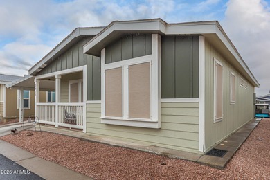 Enjoy easy living in this charming 3-bedroom mobile home with on Viewpoint Golf Resort in Arizona - for sale on GolfHomes.com, golf home, golf lot