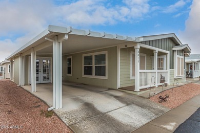 Enjoy easy living in this charming 3-bedroom mobile home with on Viewpoint Golf Resort in Arizona - for sale on GolfHomes.com, golf home, golf lot