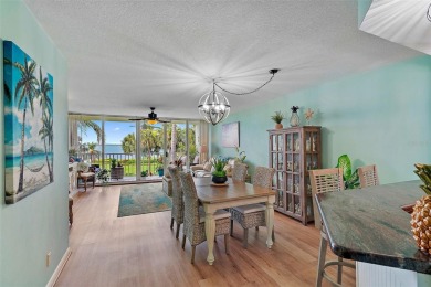 This beautifully updated 2-bedroom plus den residence in the on Isla Del Sol Yacht and Country Club in Florida - for sale on GolfHomes.com, golf home, golf lot