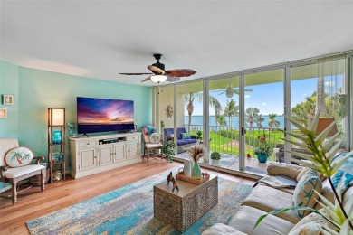 This beautifully updated 2-bedroom plus den residence in the on Isla Del Sol Yacht and Country Club in Florida - for sale on GolfHomes.com, golf home, golf lot