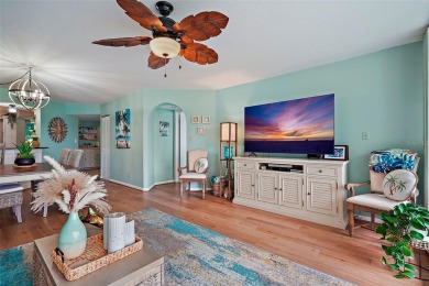 This beautifully updated 2-bedroom plus den residence in the on Isla Del Sol Yacht and Country Club in Florida - for sale on GolfHomes.com, golf home, golf lot