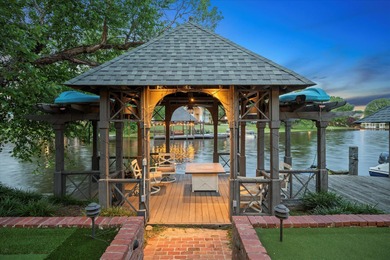 Live your best life on the water in exclusive Canebrake! This on Canebrake Country Club in Mississippi - for sale on GolfHomes.com, golf home, golf lot