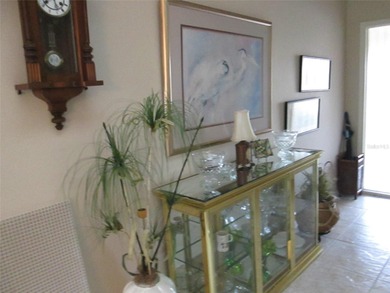 This exquisitely furnished turnkey villa is located  on the on Kingsway Country Club in Florida - for sale on GolfHomes.com, golf home, golf lot