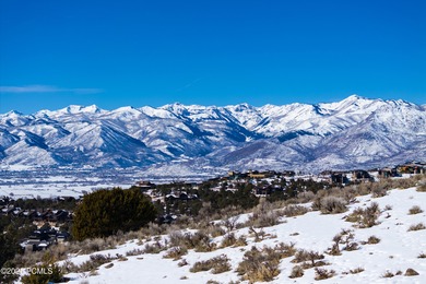 This exceptional lot sits on one of the premier streets in Red on Red Ledges Golf Club in Utah - for sale on GolfHomes.com, golf home, golf lot