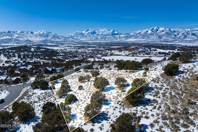 This exceptional lot sits on one of the premier streets in Red on Red Ledges Golf Club in Utah - for sale on GolfHomes.com, golf home, golf lot