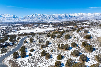 This exceptional lot sits on one of the premier streets in Red on Red Ledges Golf Club in Utah - for sale on GolfHomes.com, golf home, golf lot