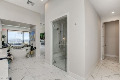 Commanding a premier spot in prestigious MacDonald Highlands on Dragon Ridge Country Club in Nevada - for sale on GolfHomes.com, golf home, golf lot