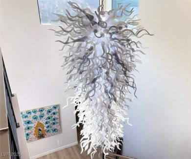 Commanding a premier spot in prestigious MacDonald Highlands on Dragon Ridge Country Club in Nevada - for sale on GolfHomes.com, golf home, golf lot