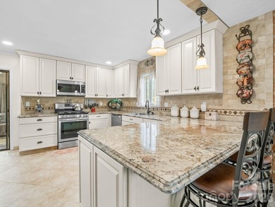 Renovated with thoughtful upgrades, and improvements, this on Crooked Creek Golf Course in North Carolina - for sale on GolfHomes.com, golf home, golf lot