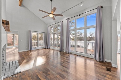 Welcome home to this beautiful lakefront property in Seven Lakes on Seven Lakes Country Club in North Carolina - for sale on GolfHomes.com, golf home, golf lot