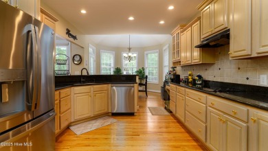 Welcome to this stunning property located in the prestigious on Pinewild Country Club of Pinehurst in North Carolina - for sale on GolfHomes.com, golf home, golf lot