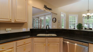 Welcome to this stunning property located in the prestigious on Pinewild Country Club of Pinehurst in North Carolina - for sale on GolfHomes.com, golf home, golf lot