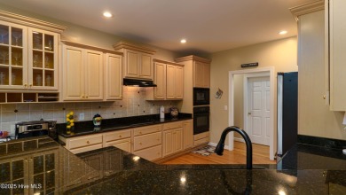 Welcome to this stunning property located in the prestigious on Pinewild Country Club of Pinehurst in North Carolina - for sale on GolfHomes.com, golf home, golf lot