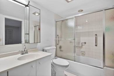 ASSOC REQUIRES 15% DOWN & 1 OCCUP 55+ VACANT/CLICK ON SHOWING on Wynmoor Golf Course in Florida - for sale on GolfHomes.com, golf home, golf lot