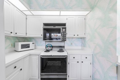 Discover exceptional potential in this meticulously maintained on Quail Ridge Golf Course and Country Club in Florida - for sale on GolfHomes.com, golf home, golf lot