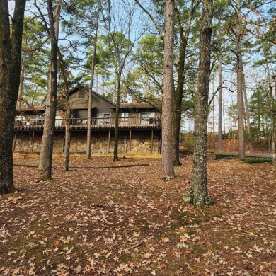 Peaceful Retreat in the Heart of Eden Isle. Escape to this on Red Apple Inn and Country Club in Arkansas - for sale on GolfHomes.com, golf home, golf lot