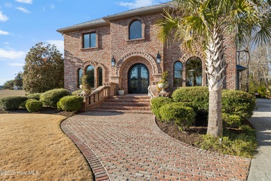 Prepare to be wowed! A must see in person, this custom brick on Members Club At St. James Plantation in North Carolina - for sale on GolfHomes.com, golf home, golf lot