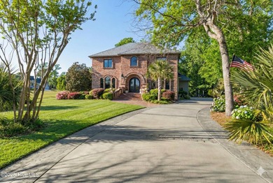 Prepare to be wowed! A must see in person, this custom brick on Members Club At St. James Plantation in North Carolina - for sale on GolfHomes.com, golf home, golf lot