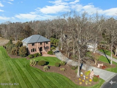 Prepare to be wowed! A must see in person, this custom brick on Members Club At St. James Plantation in North Carolina - for sale on GolfHomes.com, golf home, golf lot
