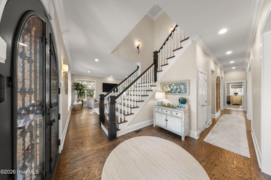 Prepare to be wowed! A must see in person, this custom brick on Members Club At St. James Plantation in North Carolina - for sale on GolfHomes.com, golf home, golf lot