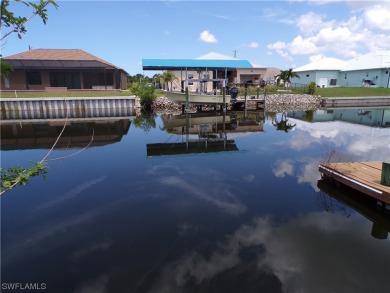This WATERFRONT lot is on a quiet street that would be a great on Rotonda Golf and Country Club - Long Marsh  in Florida - for sale on GolfHomes.com, golf home, golf lot
