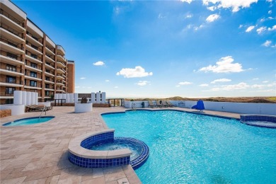 Rare, two-story penthouse condo with 1,985 sq ft of private on Palmilla Beach Golf Club in Texas - for sale on GolfHomes.com, golf home, golf lot