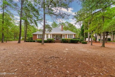 Welcome to this stunning property located in the prestigious on Pinewild Country Club of Pinehurst in North Carolina - for sale on GolfHomes.com, golf home, golf lot
