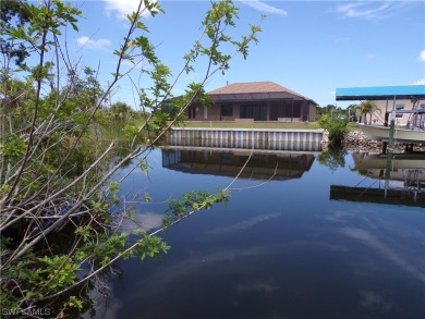 This WATERFRONT lot is on a quiet street that would be a great on Rotonda Golf and Country Club - Long Marsh  in Florida - for sale on GolfHomes.com, golf home, golf lot