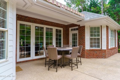 Welcome to this stunning property located in the prestigious on Pinewild Country Club of Pinehurst in North Carolina - for sale on GolfHomes.com, golf home, golf lot