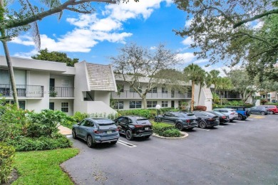 Nestled in the highly desirable Palm Aire Estates, this on Palm-Aire Country Club and Resort - The Oaks in Florida - for sale on GolfHomes.com, golf home, golf lot