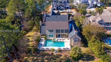 This expansive home is an entertainer's dream, featuring an open on Long Cove Club in South Carolina - for sale on GolfHomes.com, golf home, golf lot