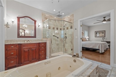 Welcome to refined living at Pinewild Country Club-a private on Pinewild Country Club of Pinehurst in North Carolina - for sale on GolfHomes.com, golf home, golf lot
