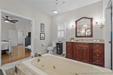 Welcome to refined living at Pinewild Country Club-a private on Pinewild Country Club of Pinehurst in North Carolina - for sale on GolfHomes.com, golf home, golf lot