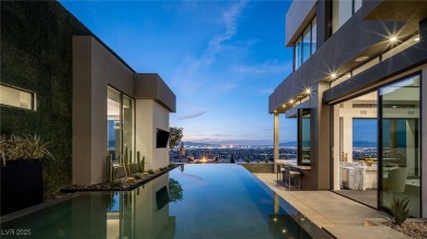 Wow! This ultra-modern FULLY CUSTOM MASTERPIECE offers on Dragon Ridge Country Club in Nevada - for sale on GolfHomes.com, golf home, golf lot