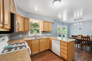 Step into tranquility w/ this stunning 3-bedroom, 1.5-bath home on Lake Monterey Golf Club in Michigan - for sale on GolfHomes.com, golf home, golf lot