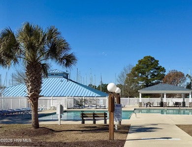 Welcome to refined coastal living inside the gates of Fairfield on Harbour Point Golf Club in North Carolina - for sale on GolfHomes.com, golf home, golf lot