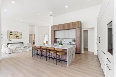 RARELY AVAILABLE COMPLETELY REMODELED CONTEMPORARY SINGLE FAMILY on Breakers Rees Jones Course in Florida - for sale on GolfHomes.com, golf home, golf lot