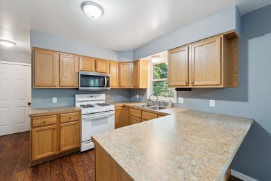 Step into tranquility w/ this stunning 3-bedroom, 1.5-bath home on Lake Monterey Golf Club in Michigan - for sale on GolfHomes.com, golf home, golf lot