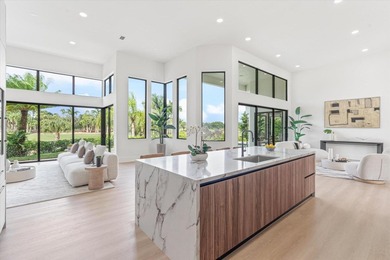 RARELY AVAILABLE COMPLETELY REMODELED CONTEMPORARY SINGLE FAMILY on Breakers Rees Jones Course in Florida - for sale on GolfHomes.com, golf home, golf lot