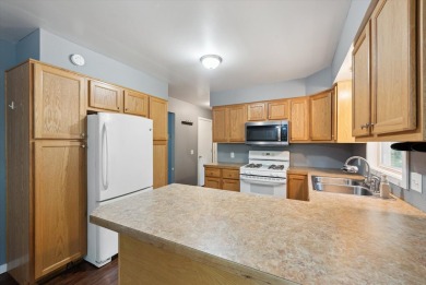 Step into tranquility w/ this stunning 3-bedroom, 1.5-bath home on Lake Monterey Golf Club in Michigan - for sale on GolfHomes.com, golf home, golf lot
