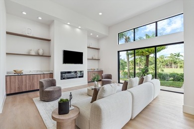RARELY AVAILABLE COMPLETELY REMODELED CONTEMPORARY SINGLE FAMILY on Breakers Rees Jones Course in Florida - for sale on GolfHomes.com, golf home, golf lot