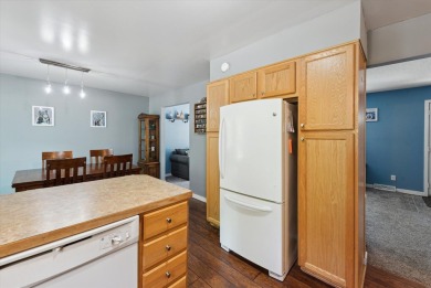 Step into tranquility w/ this stunning 3-bedroom, 1.5-bath home on Lake Monterey Golf Club in Michigan - for sale on GolfHomes.com, golf home, golf lot