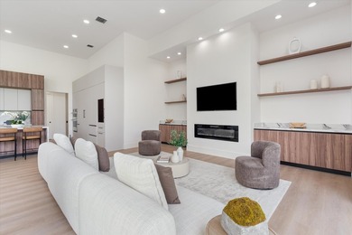 RARELY AVAILABLE COMPLETELY REMODELED CONTEMPORARY SINGLE FAMILY on Breakers Rees Jones Course in Florida - for sale on GolfHomes.com, golf home, golf lot